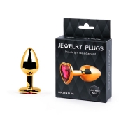Золотистая анальная пробка с малиновым кристаллом-сердечком - 7 см. - Anal Jewelry Plug - купить с доставкой в Волгодонске